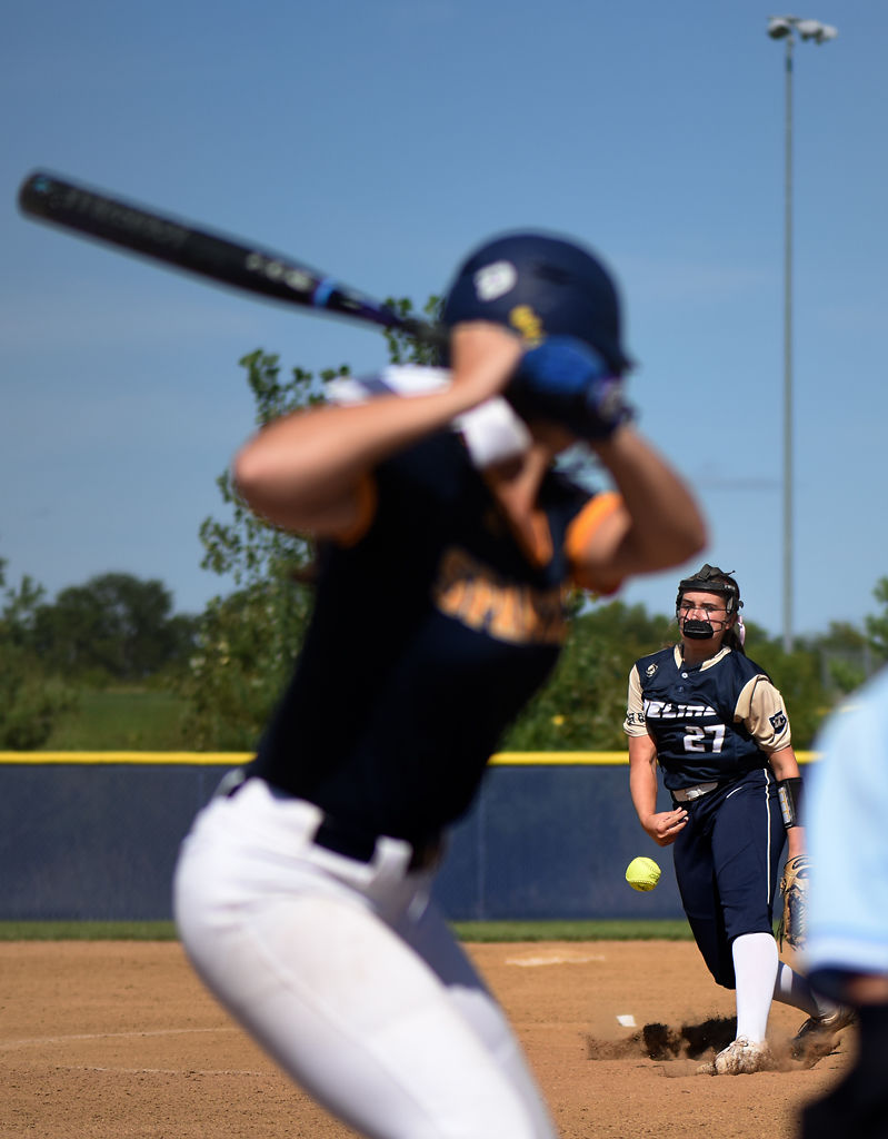 Lauren Howell throws out a pitch at a Battle hitter